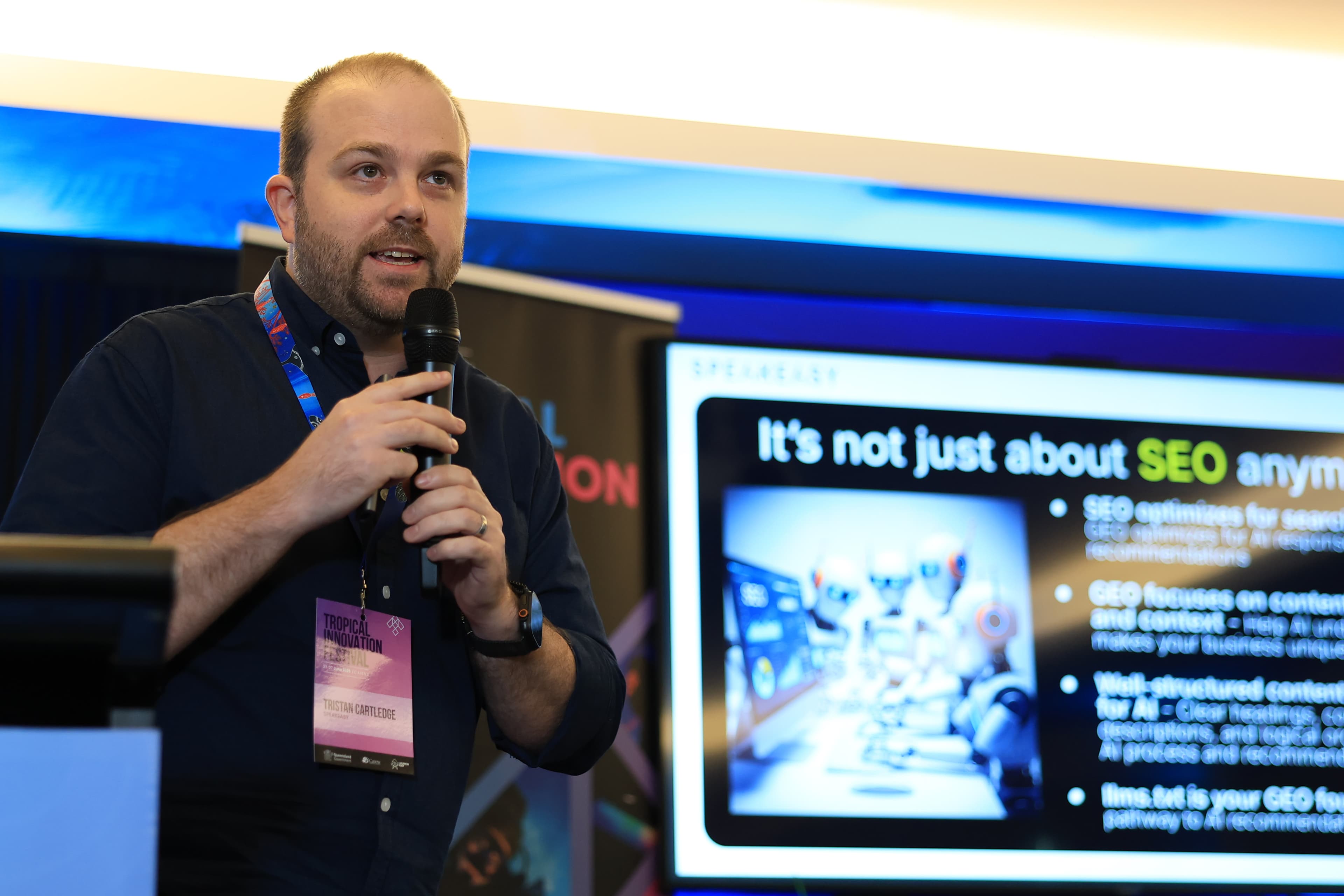 Tristan Cartledge speaking at a conference